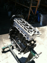 Load image into Gallery viewer, 2003 -2009 CHRYSLER PT CRUISER 2.4 LITER DOHC ENGINE REMAN W WARRANTY NON TURBO